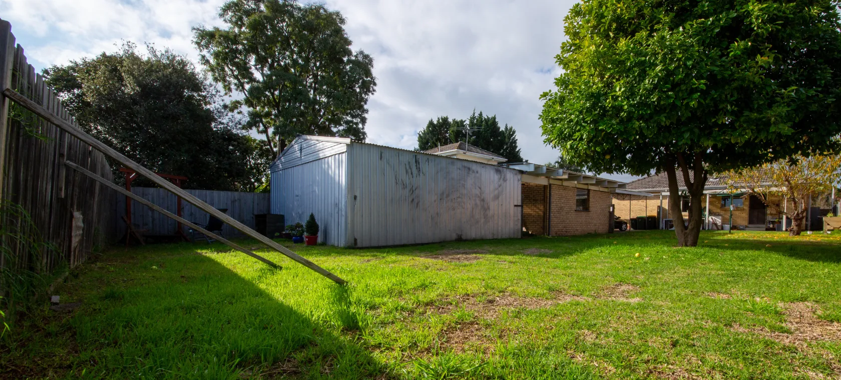 Before detached ADU builders Dallas TX project showing backyard shed area before private accessory dwelling unit construction by America ADU