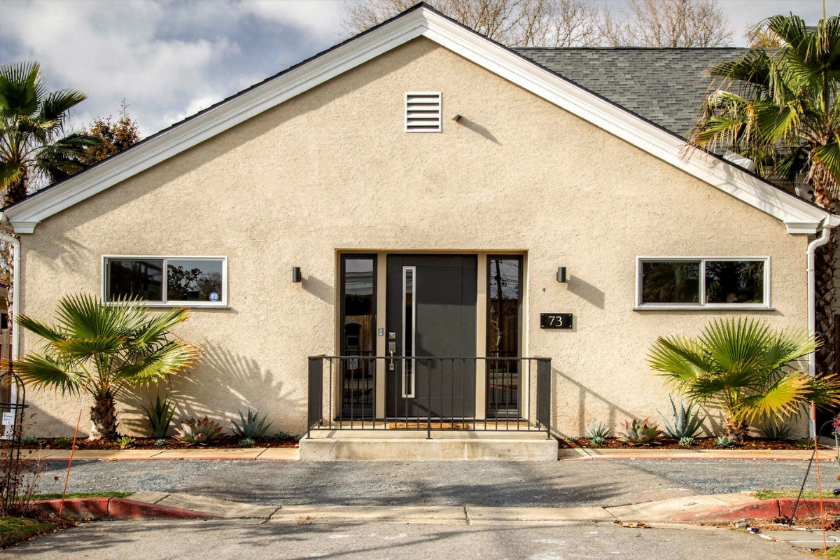 garage conversion ADU with sliding glass doors and open interior living space by America ADU