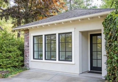contemporary backyard garage conversion ADU with large sliding glass doors by America ADU
